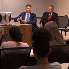 John Locallo and Judge Hartigan speak to an audience of law school students at ISBA Day at DePaul University College of Law.
