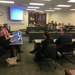 Atanu Das, Andrew Vaughn, William Love, and Judith Dever&nbsp;speak to an audience of law students at ISBA Day at Loyola University Chicago School of Law.
