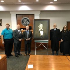 A high-quality reproduction of a famous Abraham Lincoln photograph was presented to the Clinton County Courthouse on September 25 in Carlyle.