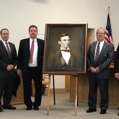 A high-quality reproduction of a famous Abraham Lincoln photograph was presented to the Henderson County Courthouse on July 27 in Oquawka.