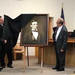 A high-quality reproduction of a famous Abraham Lincoln photograph was presented to the Henderson County Courthouse on July 27 in Oquawka.