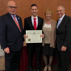 ISBA President James McCluskey with new attorney David Handley and family