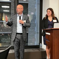 President Shawn Kasserman addresses the event mentees with Speed Networking Co-Chair Genevieve Miller