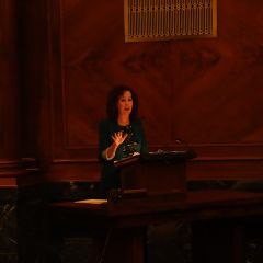 Retired Illinois Supreme Court Clerk Carolyn Taft Grosboll addresses the Fourth Judicial District candidates at the morning ceremony.