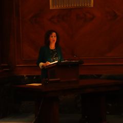 Retired Illinois Supreme Court Clerk Carolyn Taft Grosboll addresses the Fourth Judicial District candidates at the morning ceremony.