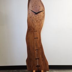 James Ahlberg: "My most prized office possession is this applewood clock I had made by an artisan in Iowa. The wood is from a macintosh apple tree of which the swings of my twin sons once hung in our backyard. It stands five feet four inches tall, so it's roughly the height of a grandmother clock."