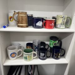 Jason Blumenthal: "I genuinely enjoy going to the office, and a big part of that is the way I've personalized the space. While I have a few photos on the wall, some knick-knacks, and other meaningful items scattered around, my most prized possession, without a doubt, is my coffee mug collection. Each mug was either gifted to me by a coworker, friend, or family member, or collected during one of my adventures. Every time I use one, I'm reminded of a happy memory or the story of how I got it." 