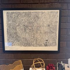 Heather Kroencke: "My prized possession in my office is this map created by my maternal grandfather in 1971. My grandfather was a geologist who worked for a large oil company. Back then, these maps/surveys were done by hand and based on extensive research to locate potential oil and gas deposits. It's a great conversation piece for clients, and I have even had a few who could read and interpret it over the years. However, the best part is my grandfather's signature in the bottom corner."