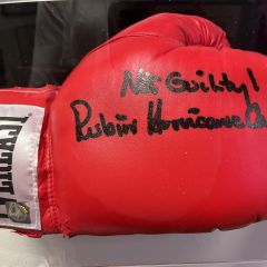 Scott Lerner: "A glove signed by Ruben 'Hurricane' Carter, the subject of the Bob Dylan song. A good reminder that lawyers and singers need to fight for the falsely accused."