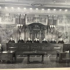 Scott Lerner: "I'm afraid I don't have much information. I got this at an estate or garage sale around 20 years ago. The justice on the far left looks like Walter T. Gunn who served on the court from 1938-1951. The justices are all white men, and the image is in black and white, giving hints at the age of the photograph. It may be a gelatin silver image. That's my guess."