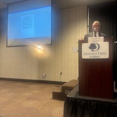 Sumner A. Bourne presents "Farmers in Financial Distress"