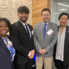 NIU Law Students network with Judge Joel Chupack at the Wine Tasting Event.