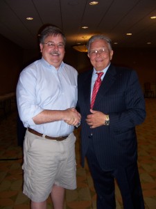 ISBA Immediate Past President Jack Carey (right) thanks Gary Cline of Springfield for his donation. 